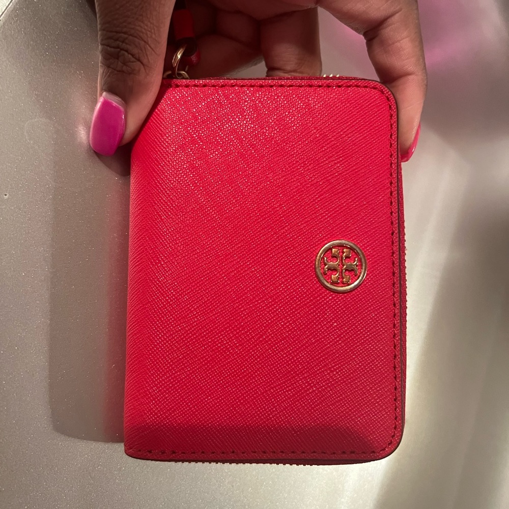 Bright red Tory burch compact wallet with key ring